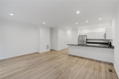 Model photos of townhomes.