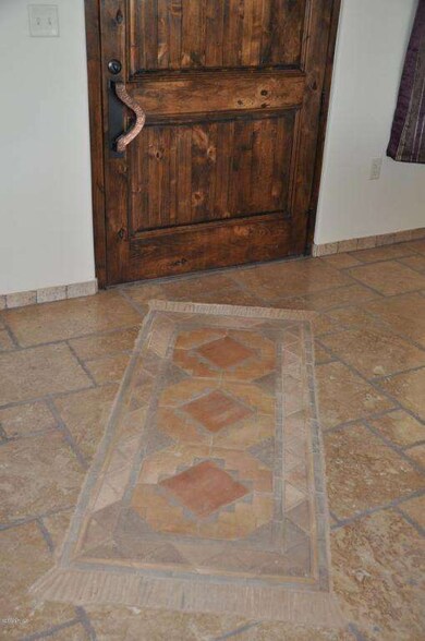 stone inset rug
