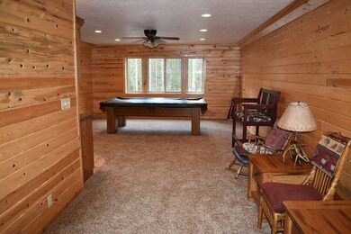 upstairs open room with pool table