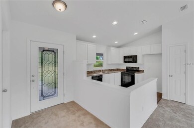 Foyer and Kitchen