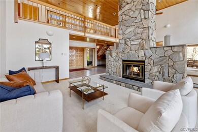 Living room with wood ceiling, high vaulted ceilin
