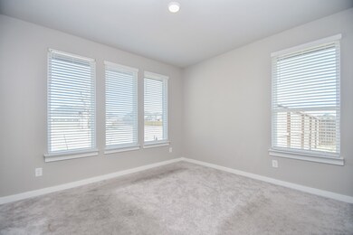 This gorgeous, carpeted front room offers pure natural sunshine from two walls with large windows! The location of this room is traditionally chosen as a home office/study. You can use it as your lifestyle desires!