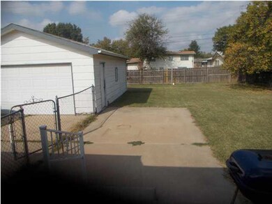 Oversized detached garage.