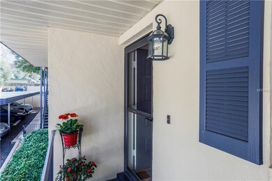 Front balcony entrance sports a new storm door wit