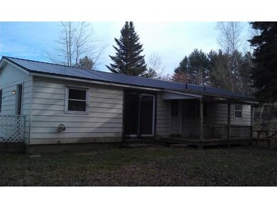 BACK OF LARGER HOME