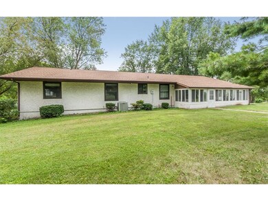A manicured lawn, plus 3-season porch, plus newer 