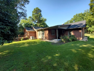 305 N 8th Ave, Piggott, AR 72454 - photo 4