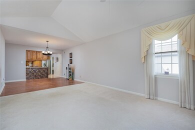 The open floor plan feels spacious and highlights