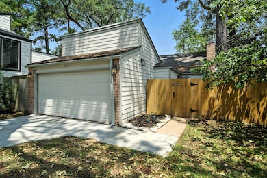 Wonderfully updated home with a private, gates entrance and mature trees all around!