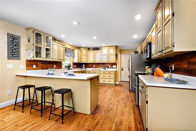This kitchen has plenty of kitchen bar space to ea
