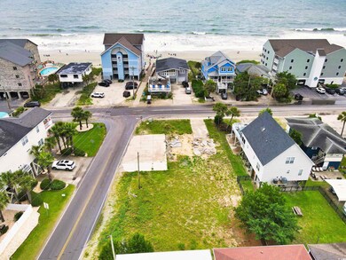 Bird's eye view with a water view and a beach view