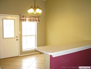 Bright dining area with tile.