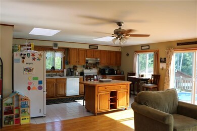Bright and sunny kitchen with island...