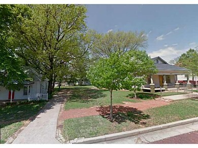 Exterior Front. The lot includes the driveway on t