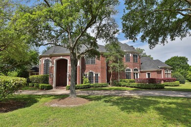 Welcome home to 12802 Wondering Forest, located within the tranquil gated neighborhood of Northgate Forest.