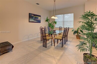 OVERSIZED FORMAL DINING ROOM.