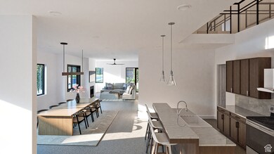 Kitchen with pendant lighting, stainless steel electric range oven, dark brown cabinets, a ceiling fan, and a kitchen bar
