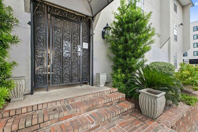 Property entrance with stucco siding