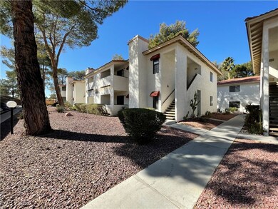 View of property with stairs