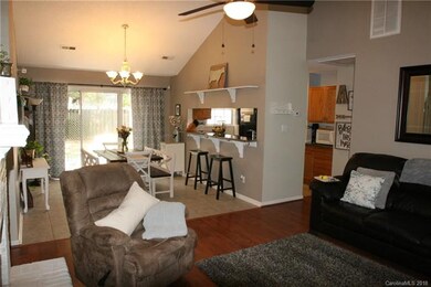 Your new living room is open to the dining area. T