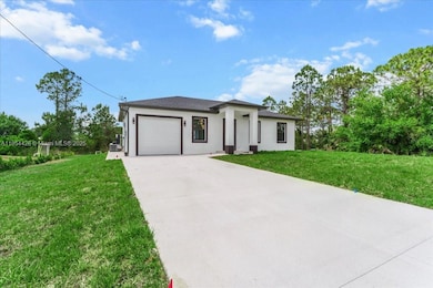 1262 Bowles Ave, Lehigh Acres, FL 33913 - photo 4