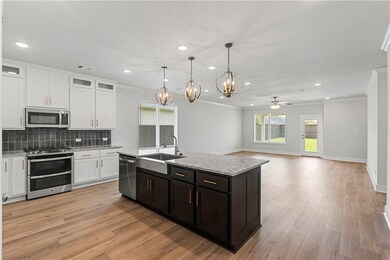 Kitchen with appliances with stainless steel finis