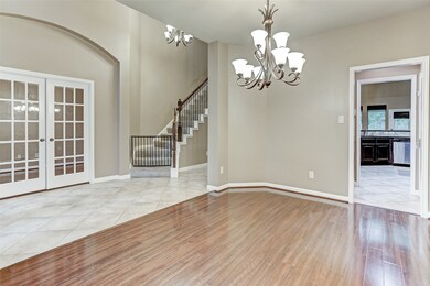 dinning room with office directly across french do