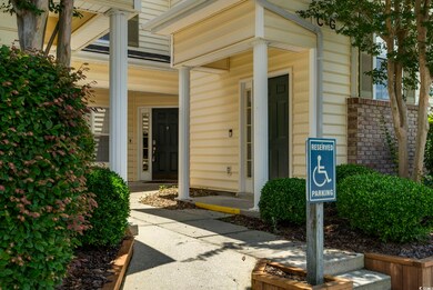 View of exterior entry featuring covered porch
