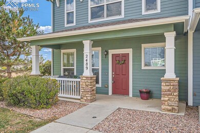Entrance to property featuring a porch