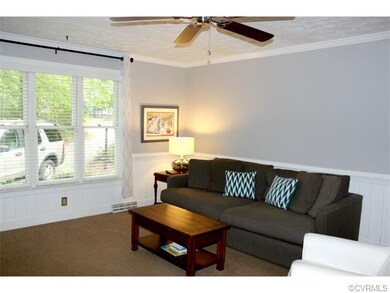 Charming family room with new carpet.....