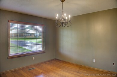 French doors open to a dining room.