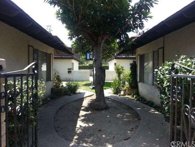 Entrance to court yard and back apartments.