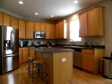 Kitchen. Kitchen boasts stainless steel appliances, new kitchen faucet and new double sink.
