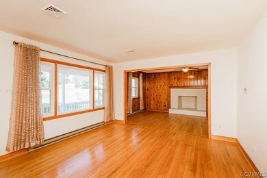 Open floor plan, looking from living room into family room