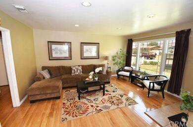 Picture Window and Hardwood Floors