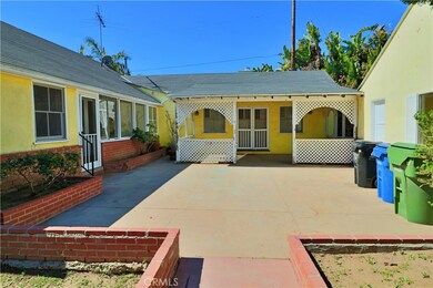 backyard patio area from just inside block wall gate