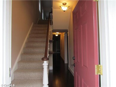 Foyer - Stairs to second level, the stairs bannist