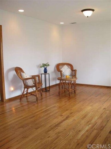 Another view of the living room with recessed ligh