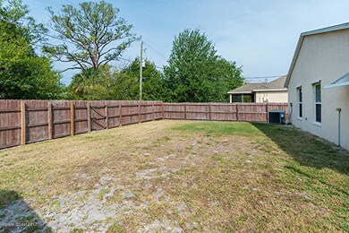 Big, fenced back yard.