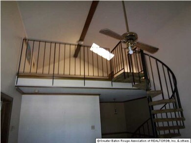Spiral stairs to loft area. Large enough for a sle