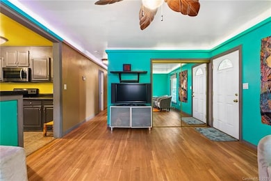 Open floor plan from living to kitchen to dining