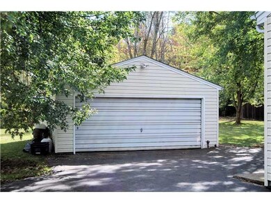 Exterior Front. 2 car detached Garage.