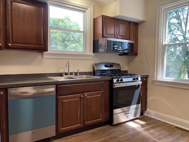 New Kitchen - floor , countertop , sink.