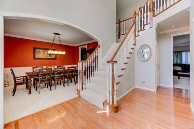 2 story entry foyer showcases the elegant T-stairc