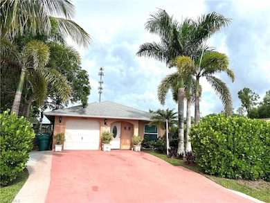 View of front of house featuring an attached garage, driveway, stucco siding, and roof with shingles