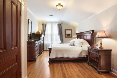 Master bedroom down.  All original solid wood door