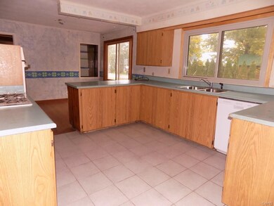 Large kitchen and dining room space.