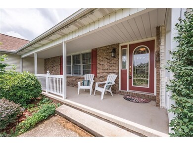 Enjoy some front porch sitting in this quiet neigh