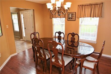 Sunlight floods the spacious dining room and spill
