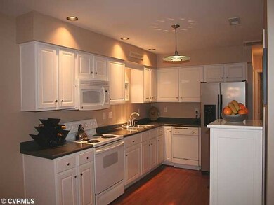 Kitchen - The kitchen has beautiful hardwood floor